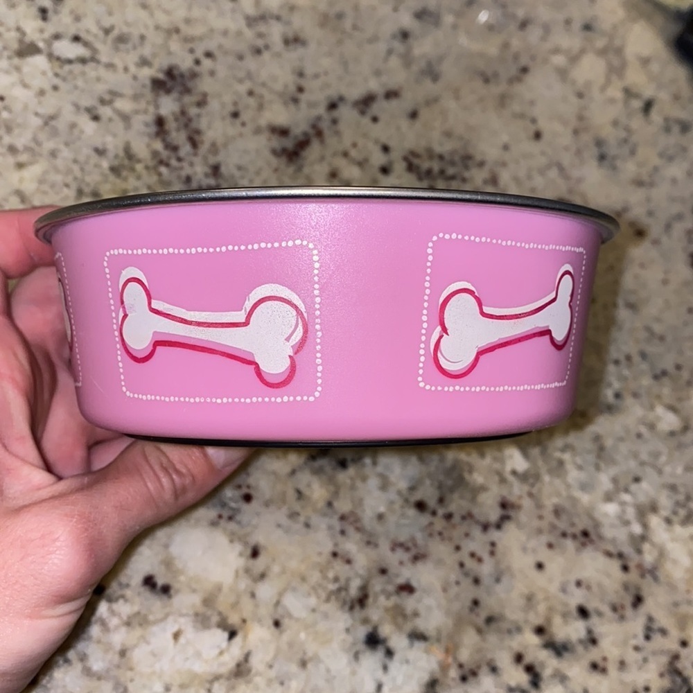 Pink & white dog food bowl with rubber stay in place bottom silver interior 5x2”